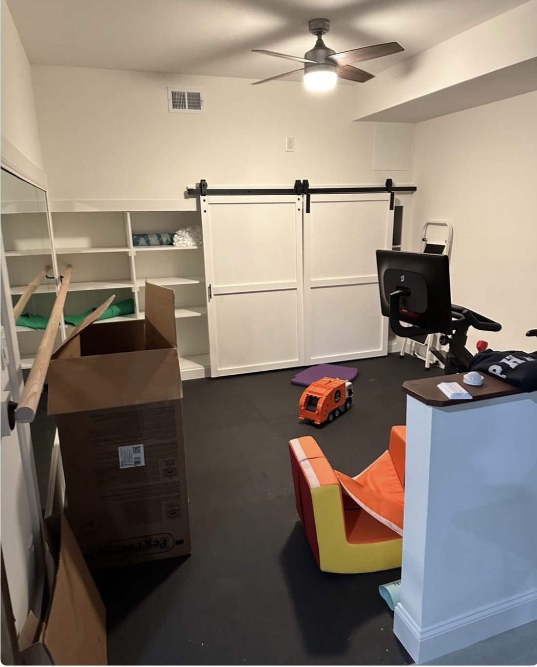 Finished basement bonus room with built-in storage